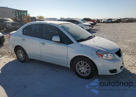 2012 Suzuki Sx4 Le z USA, uszkodzony, nr VIN JS2YC5A37C6303297